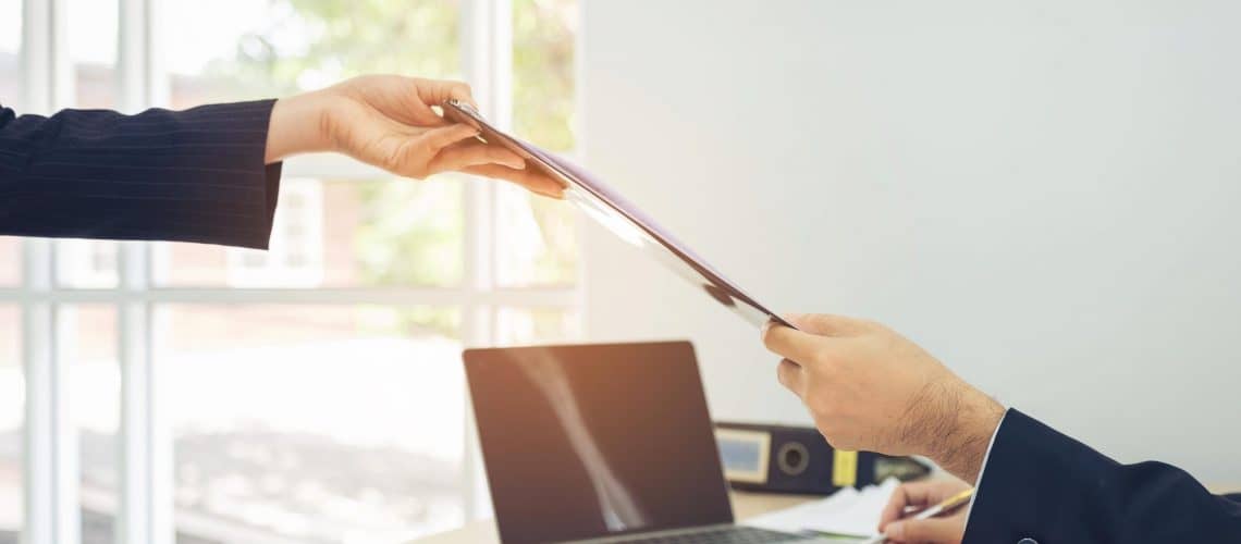 Business person sharing a file with a colleague